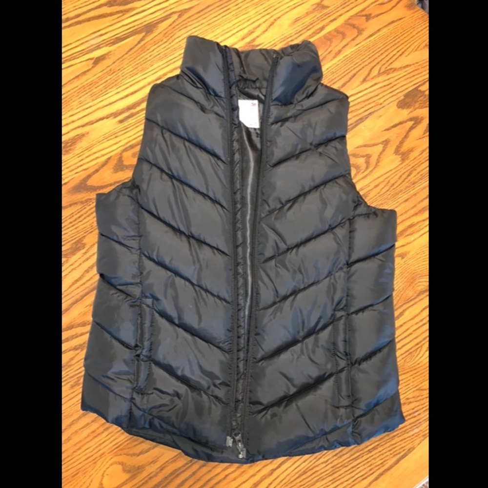 So black puffer vest